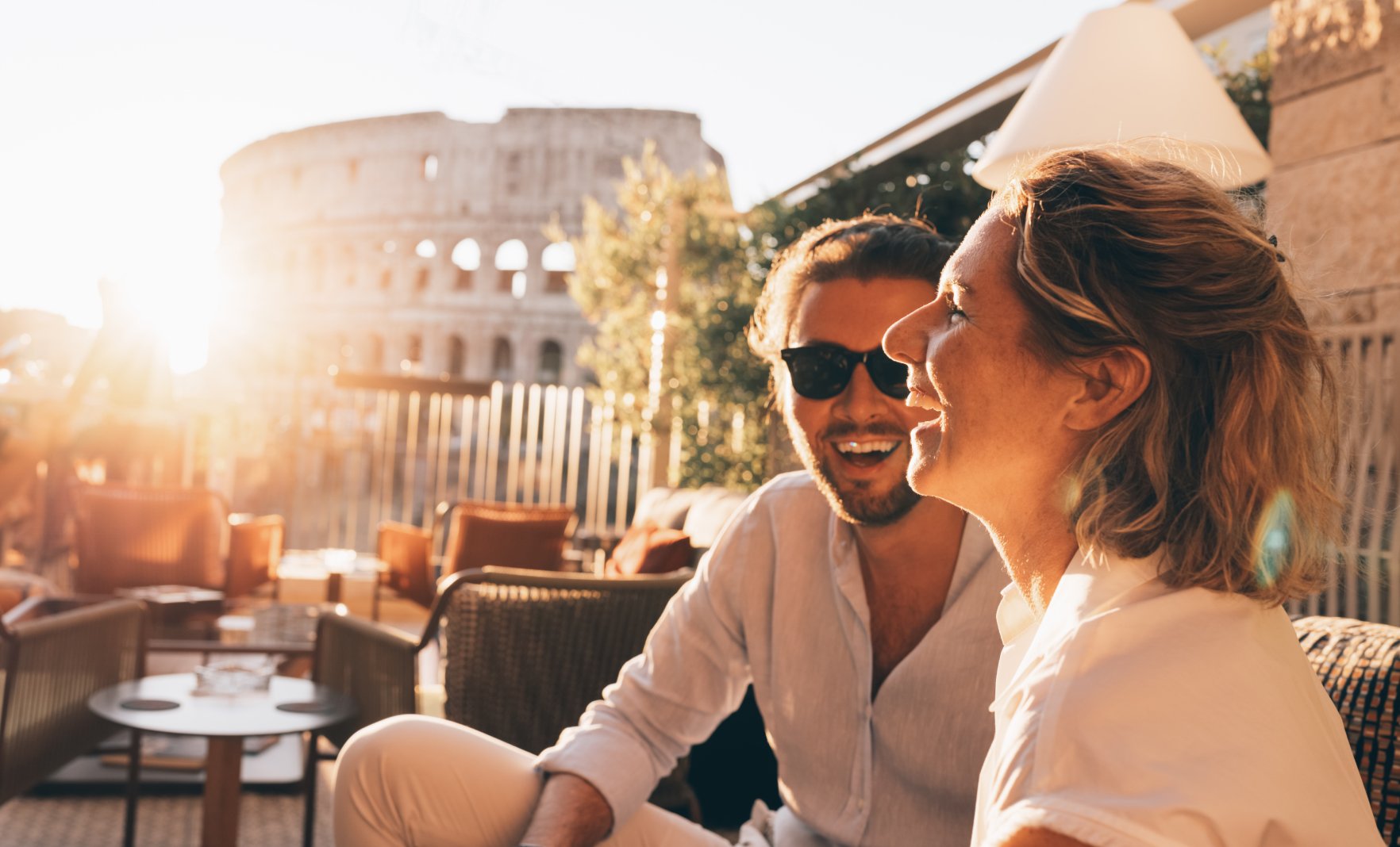 Couple laughing with scenic background Couple laughing with scenic background