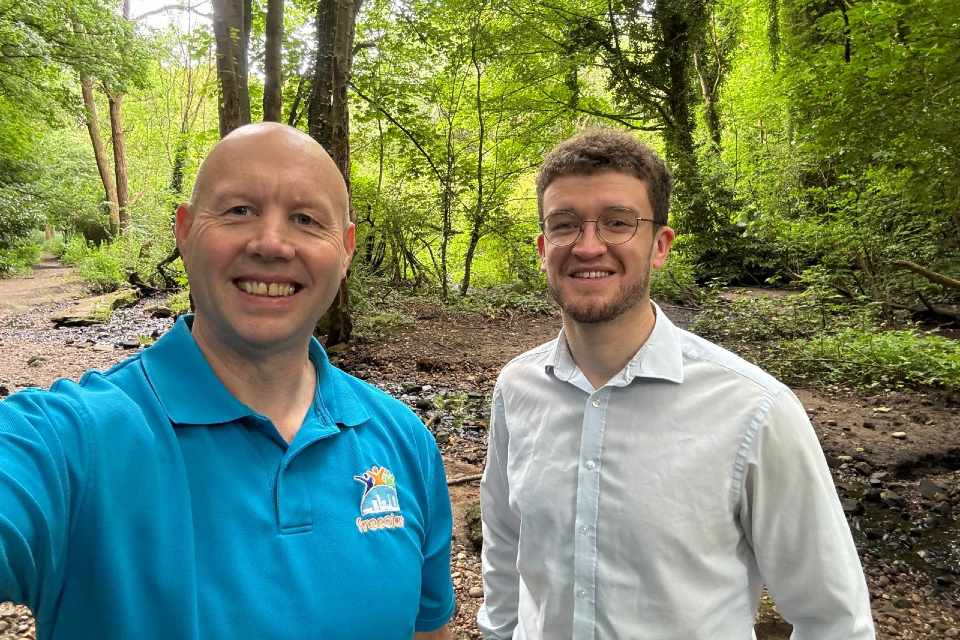 Morgan McKenzie from the Property Team (right) with a member of the Free at Last charity at the site