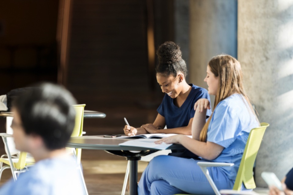 Medical students taking notes