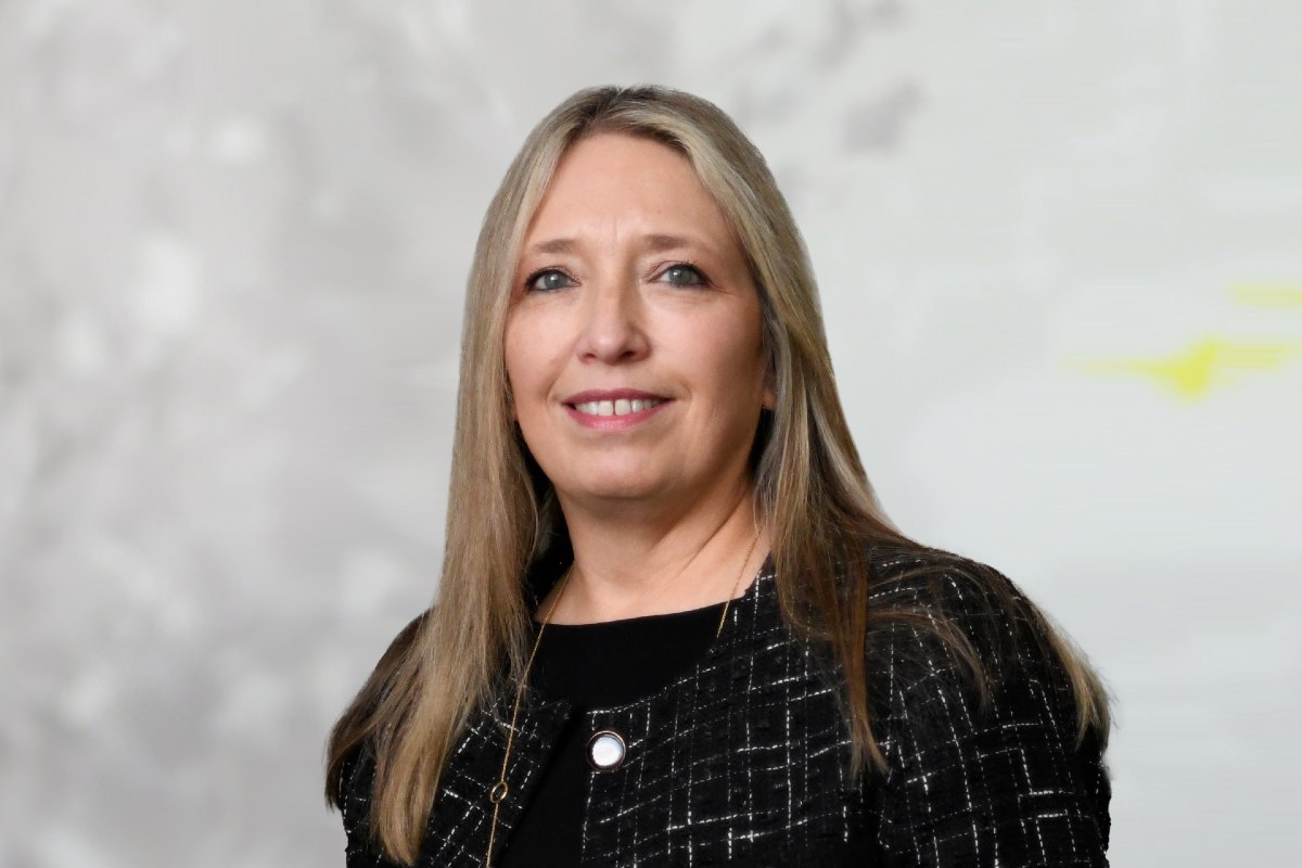 Karen Blatchford smiling in Wesleyan office