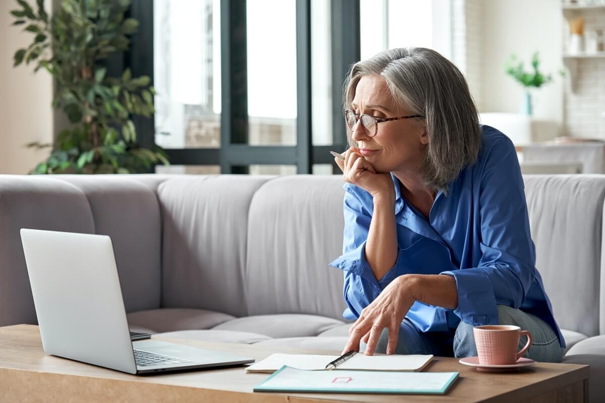 Mature woman working at home