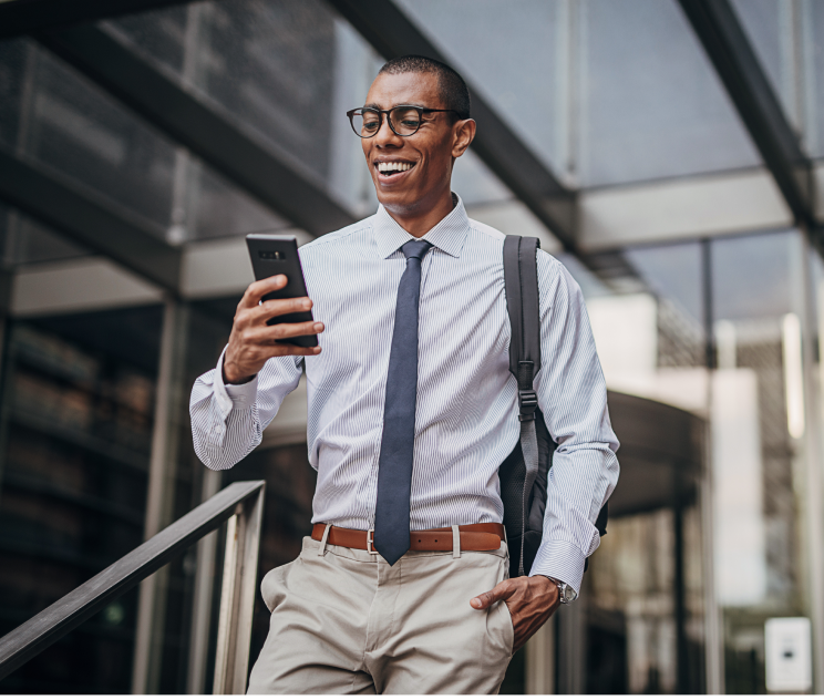 Male professional looking at his phone