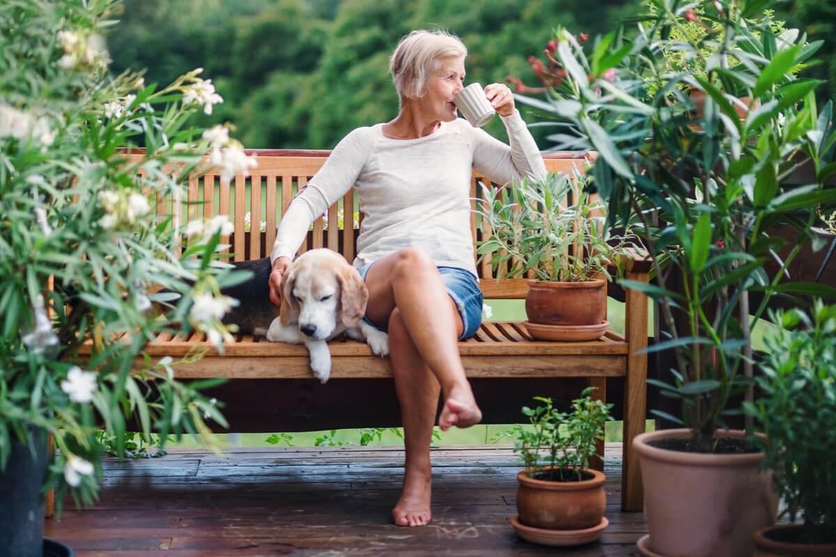 Mature woman relaxing in garden