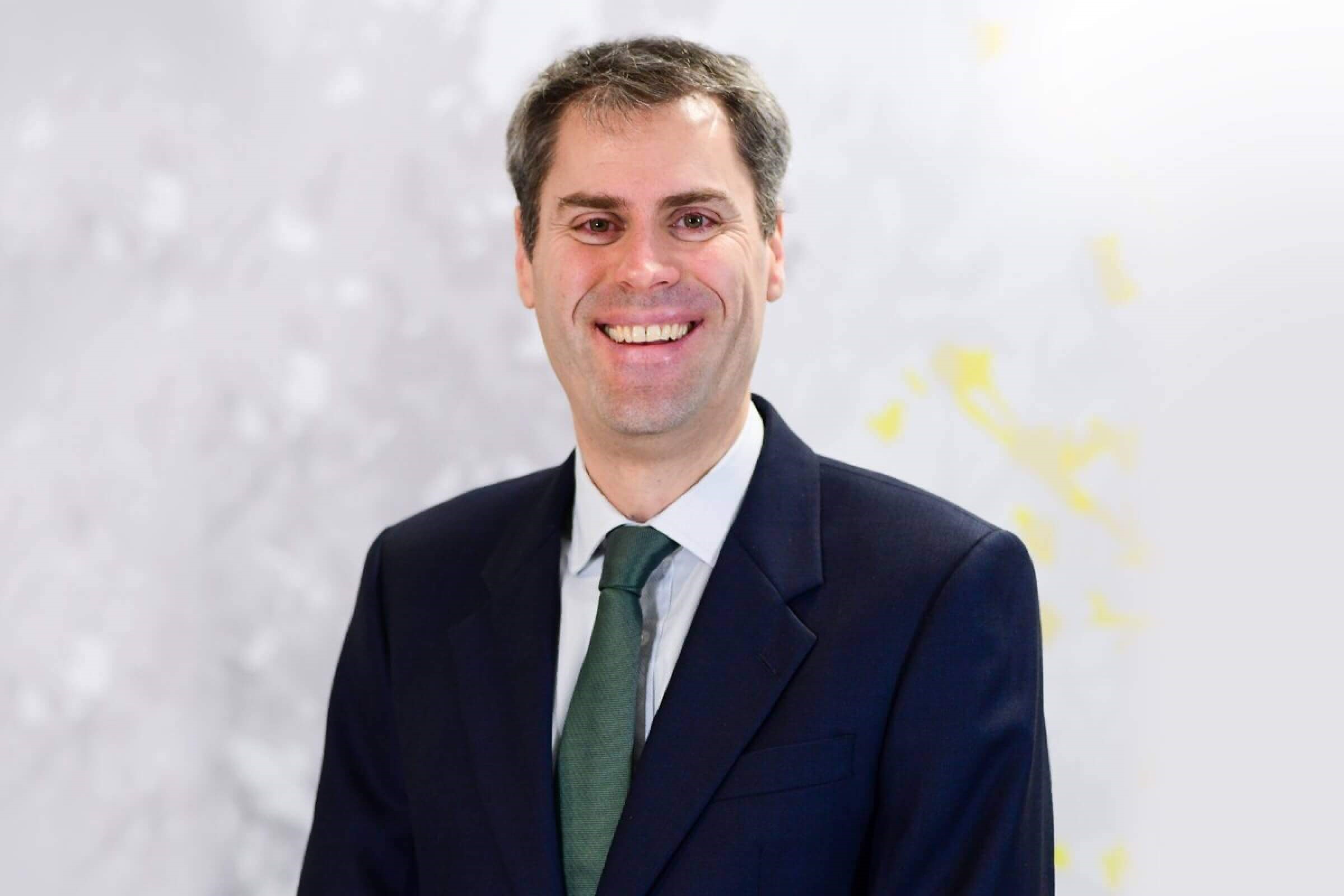 Mario Mazzocchi smiling in Wesleyan office