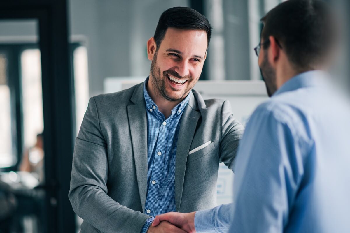 Smart casual man shaking hand