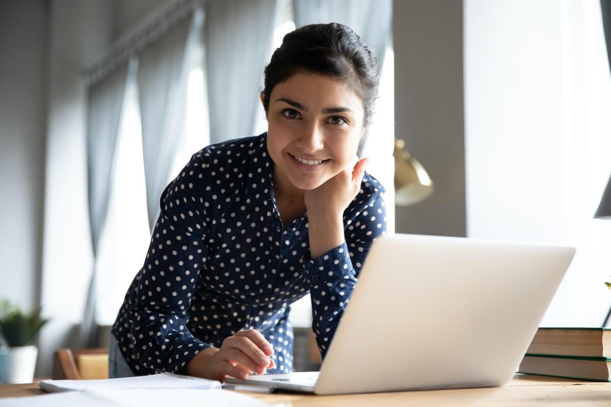 Young woman at desk working