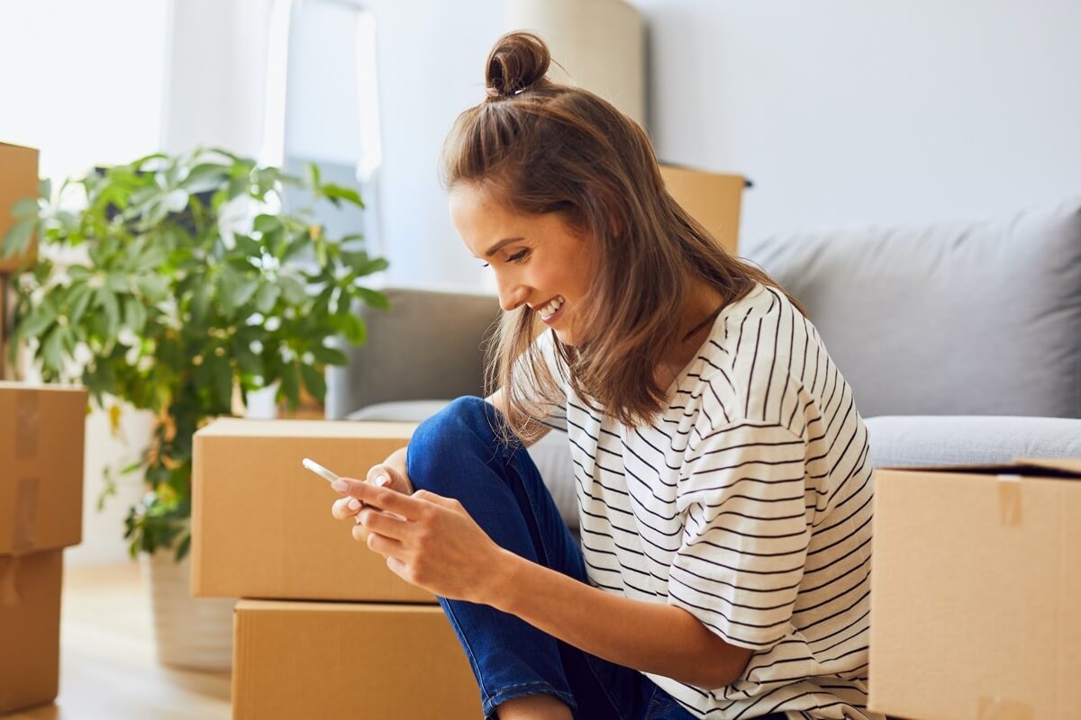 Young woman moving home