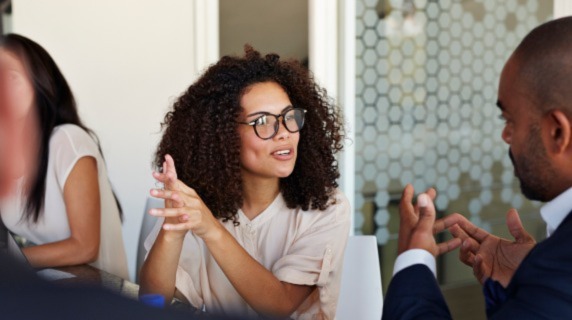 Professional woman talking in meeting