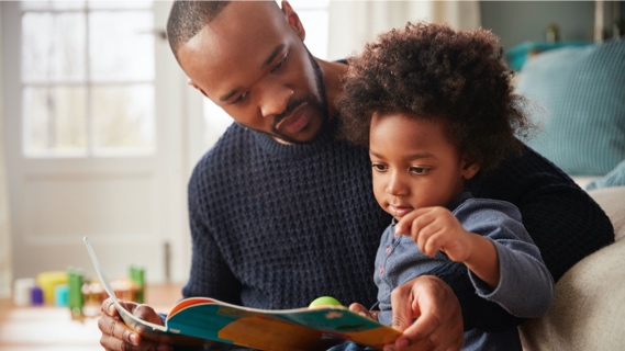 Father reading to son