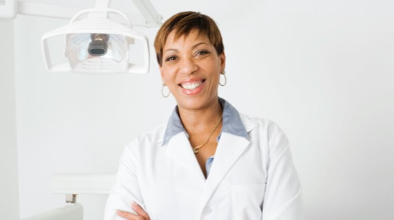 Female dentist with big smile