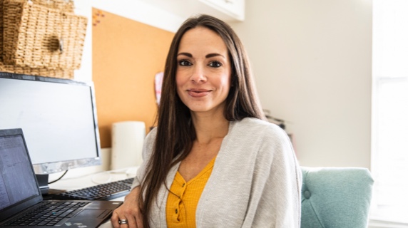 Smiling woman in home office