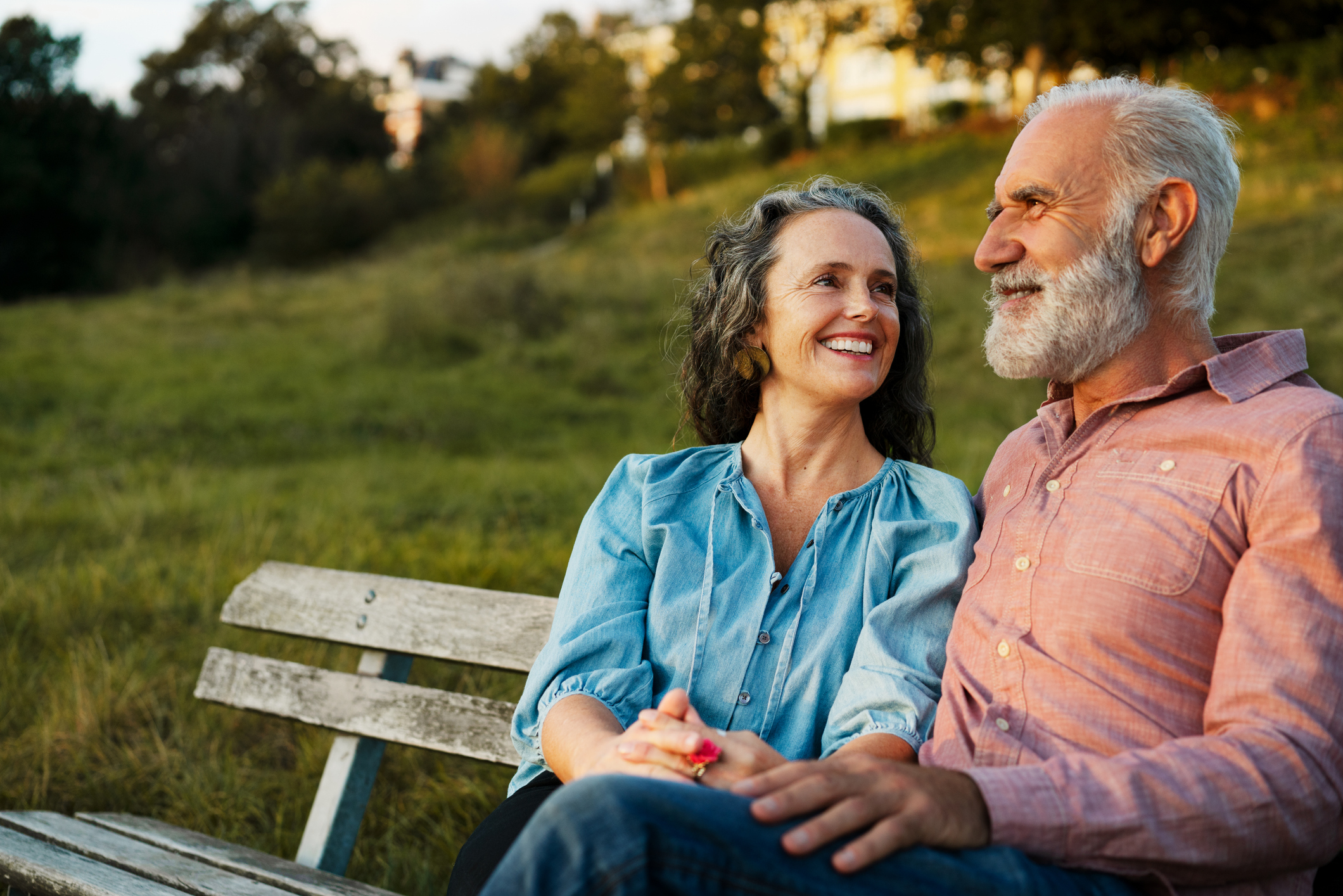 Couple sat on park bench