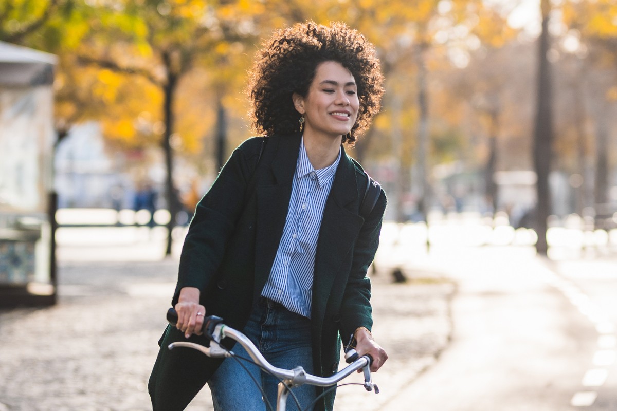 Female cycling through town