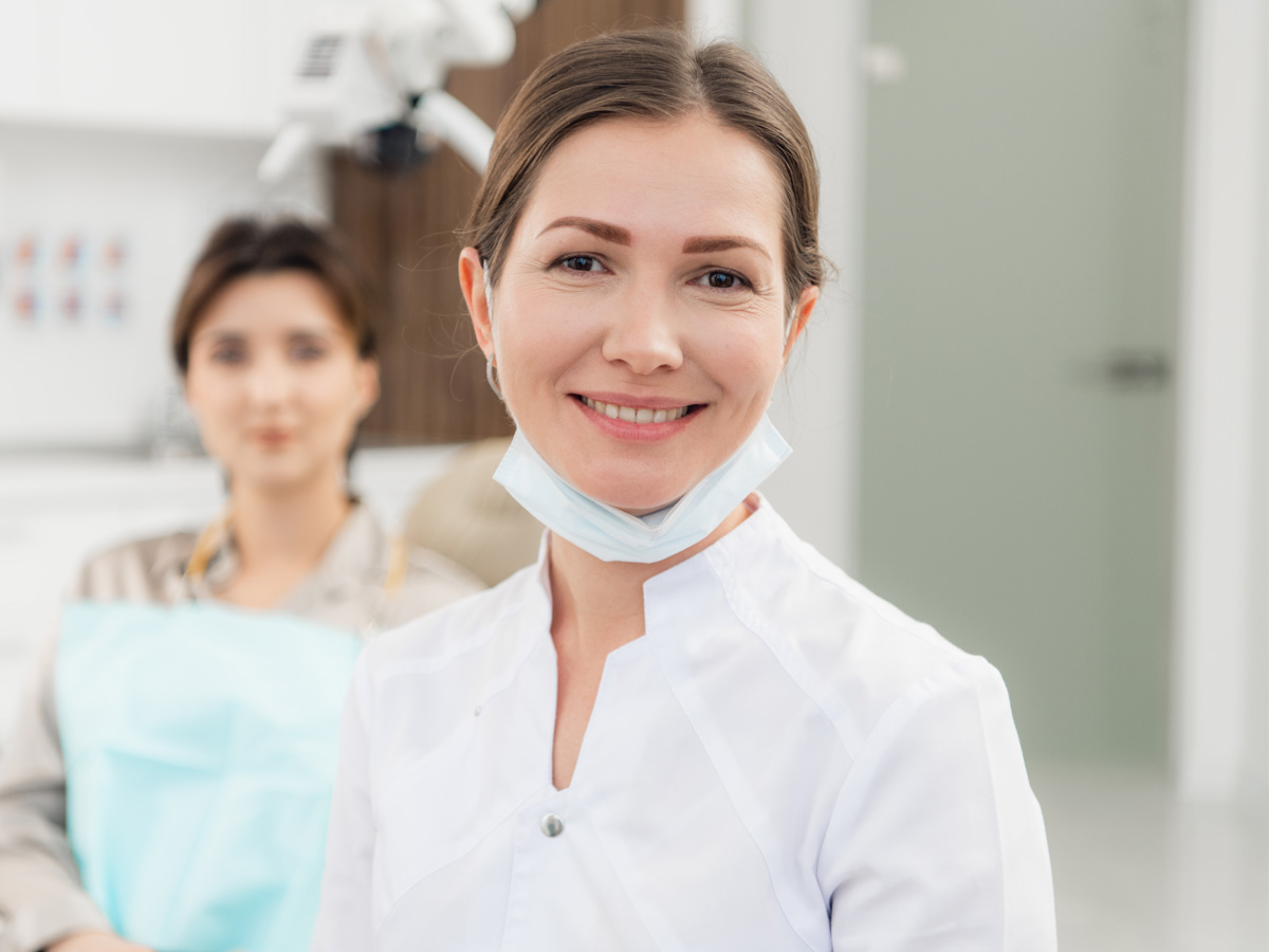 Female dentist and patient