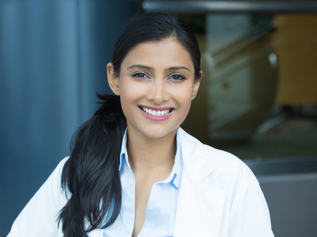 Young female doctor smiling