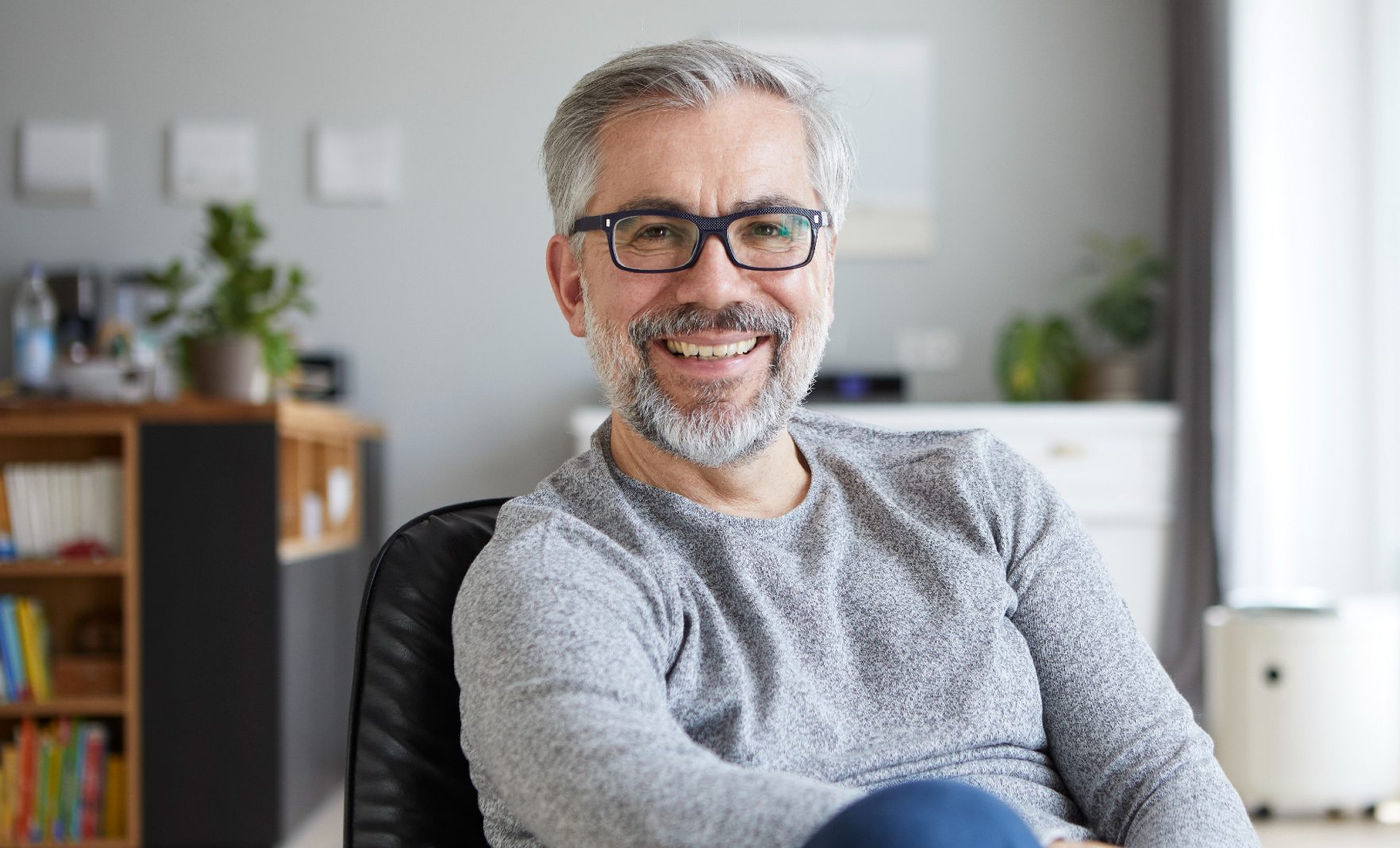 Mature male relaxing at home