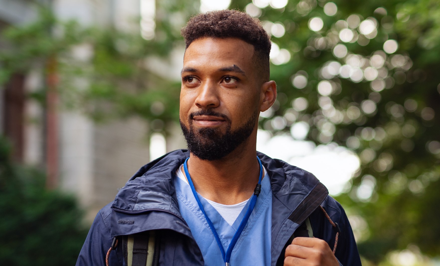 Young male dentist outdoors