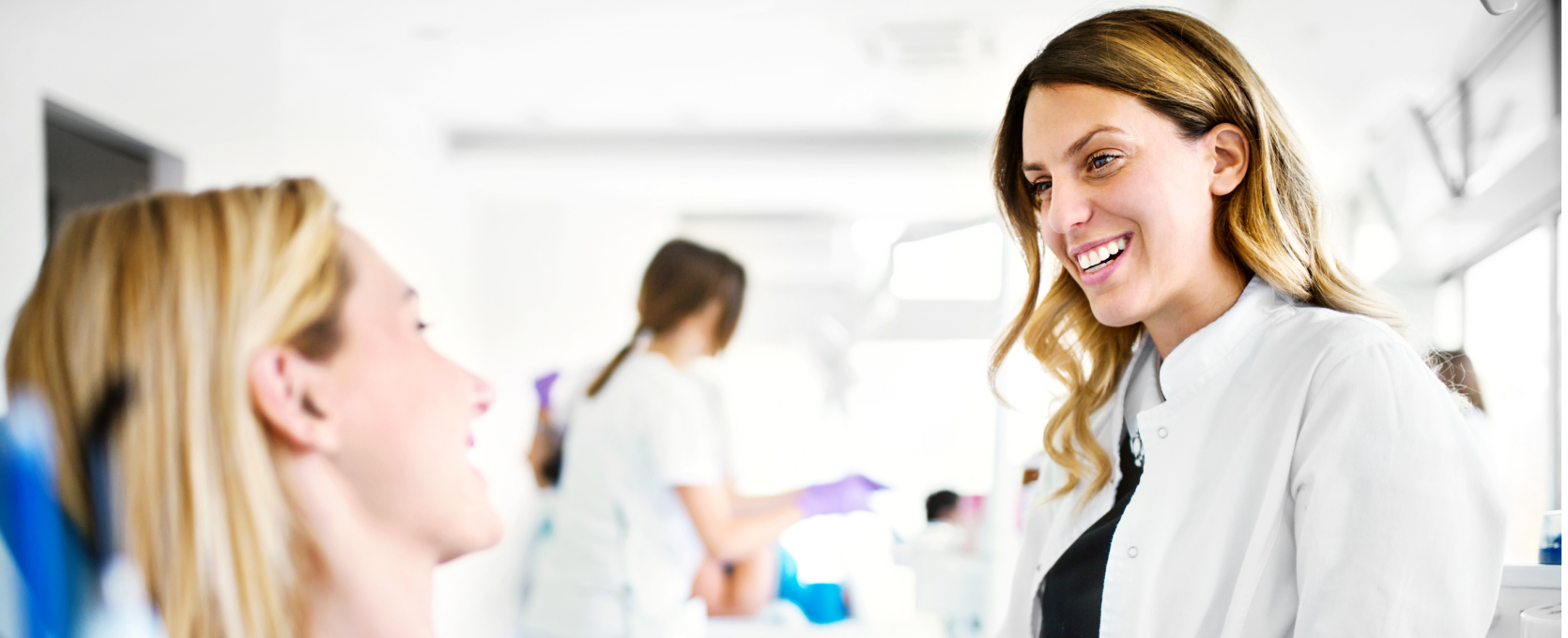 Female dentist and patient