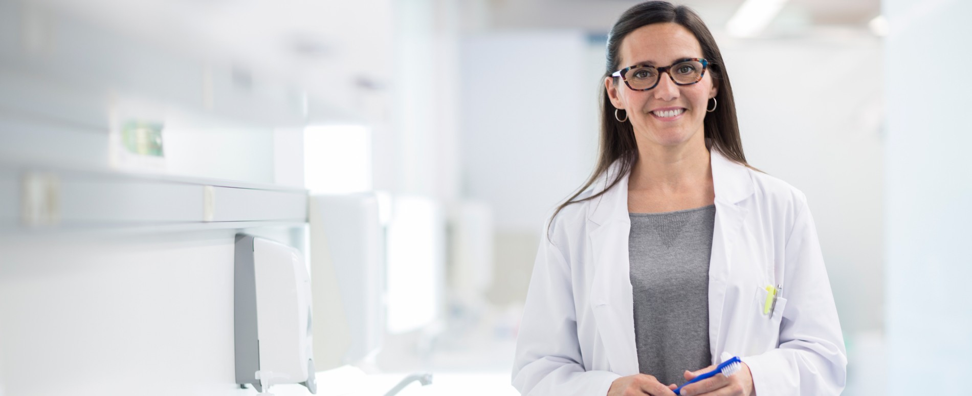 Female dentist smiling