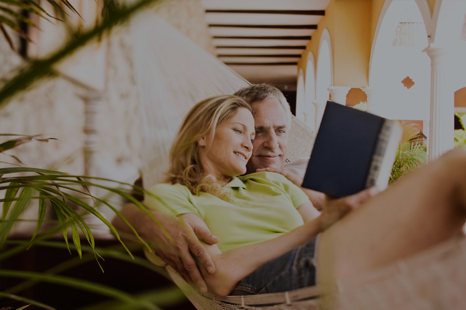 Couple reading a book together