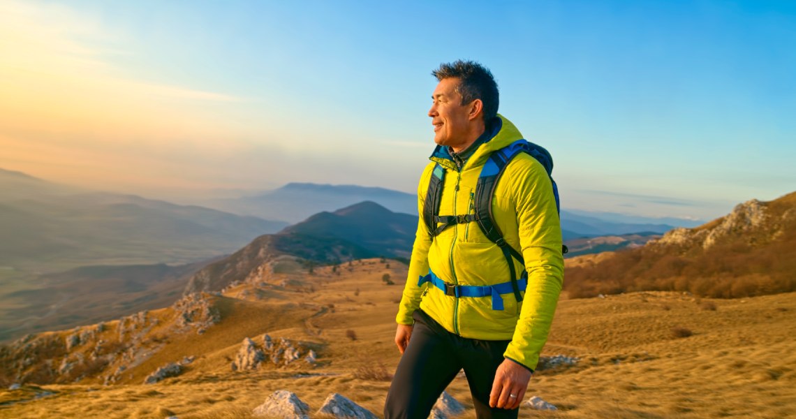 Man hiking during sunset